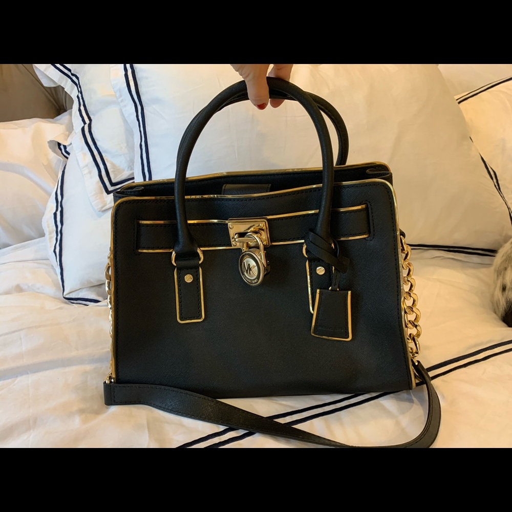 Black and gold Michael kors handbag